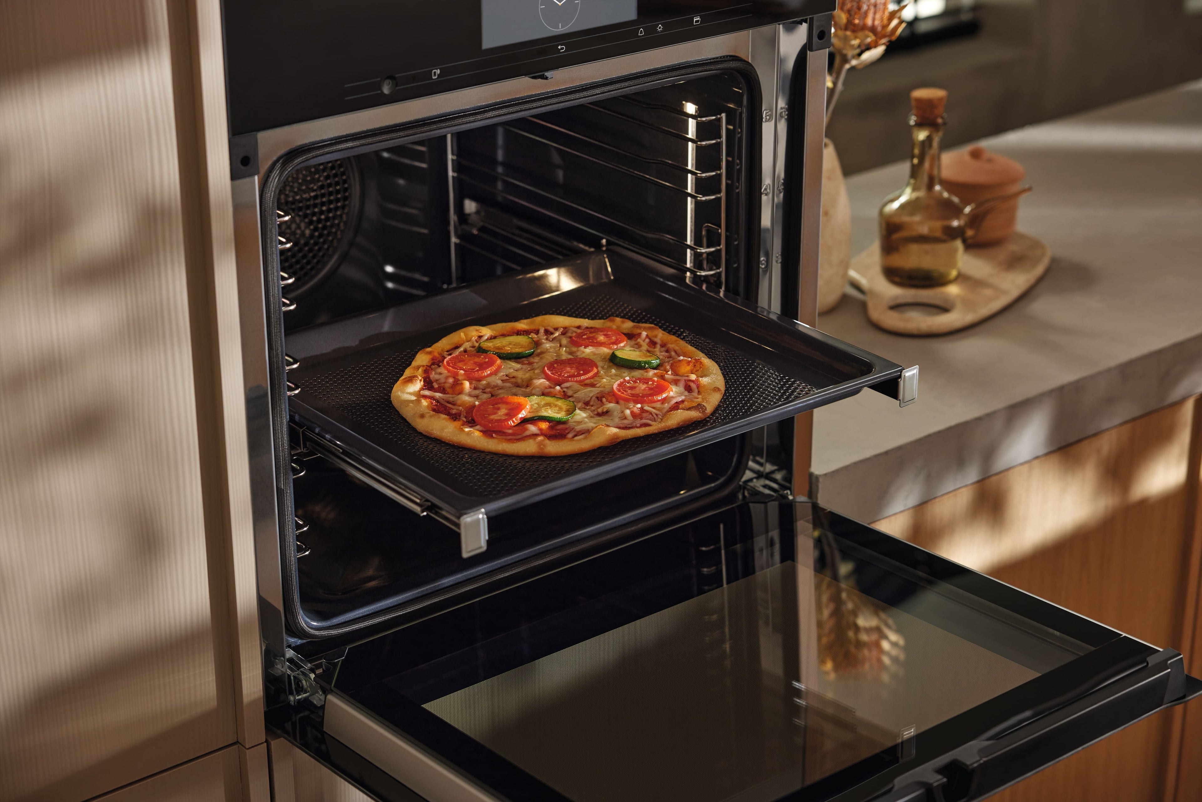 D─Ťrovan├Ż pe─Źic├ş plech AirFry Gourmet Miele HBBL 71